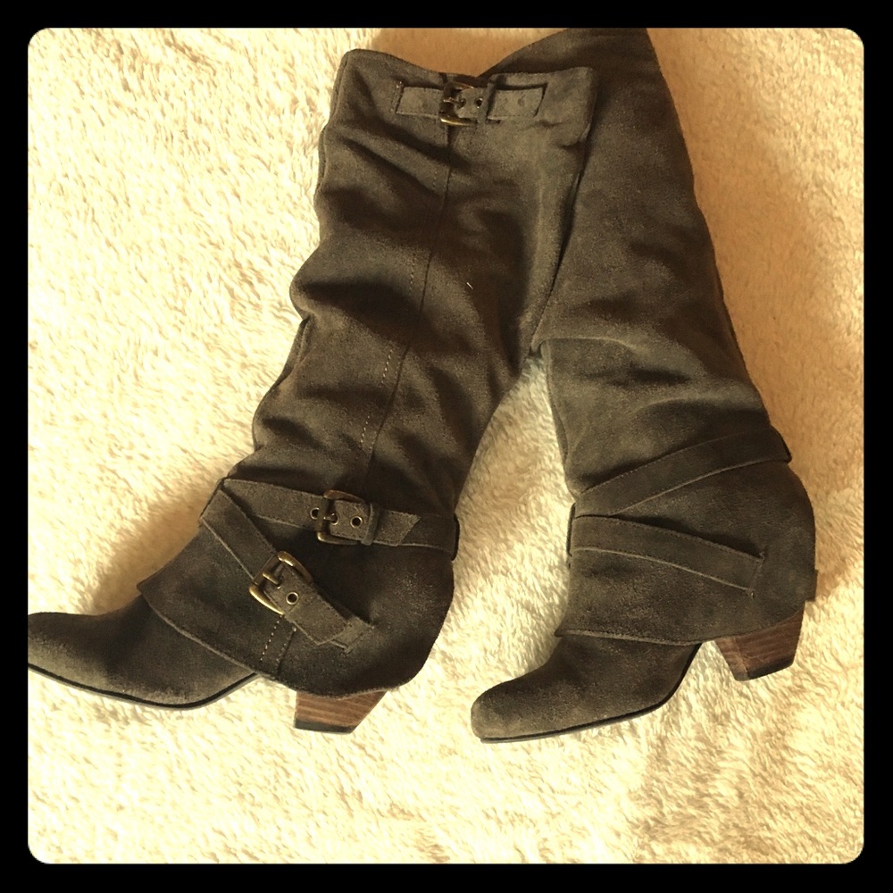 Knee high brown boots with buckles